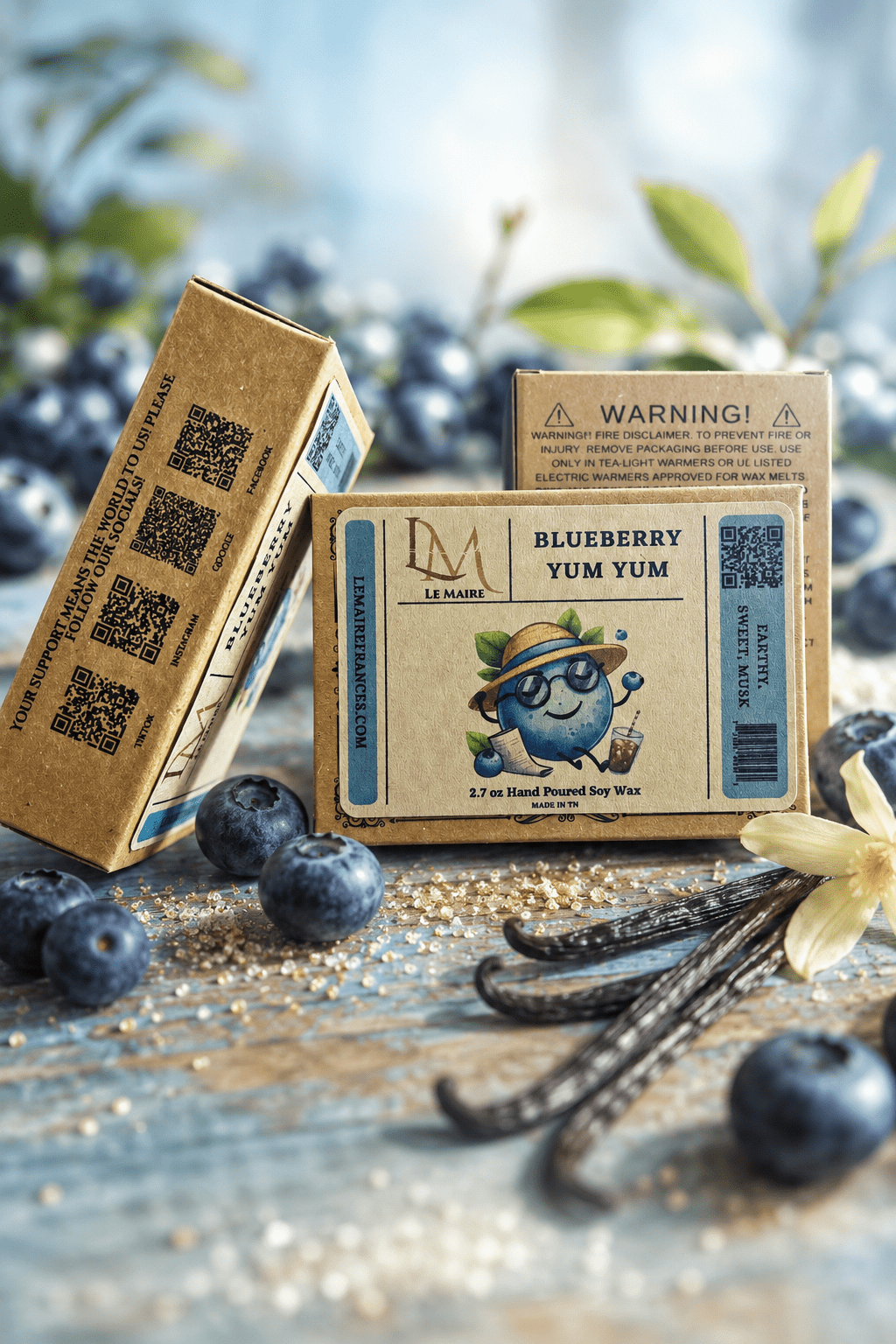 Blueberry Yum Yum wax melt packaging views with blueberry and warm earthy accents