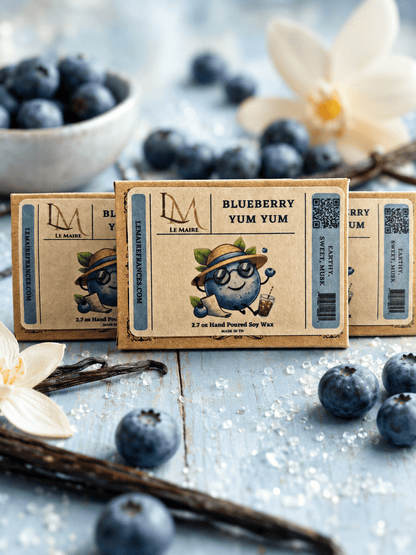Three Blueberry Yum Yum wax melt boxes with earthy blueberry aroma styling
