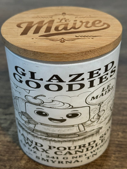 Glazed Goodies cheesecake soy candle angled view with Le Maire wood lid