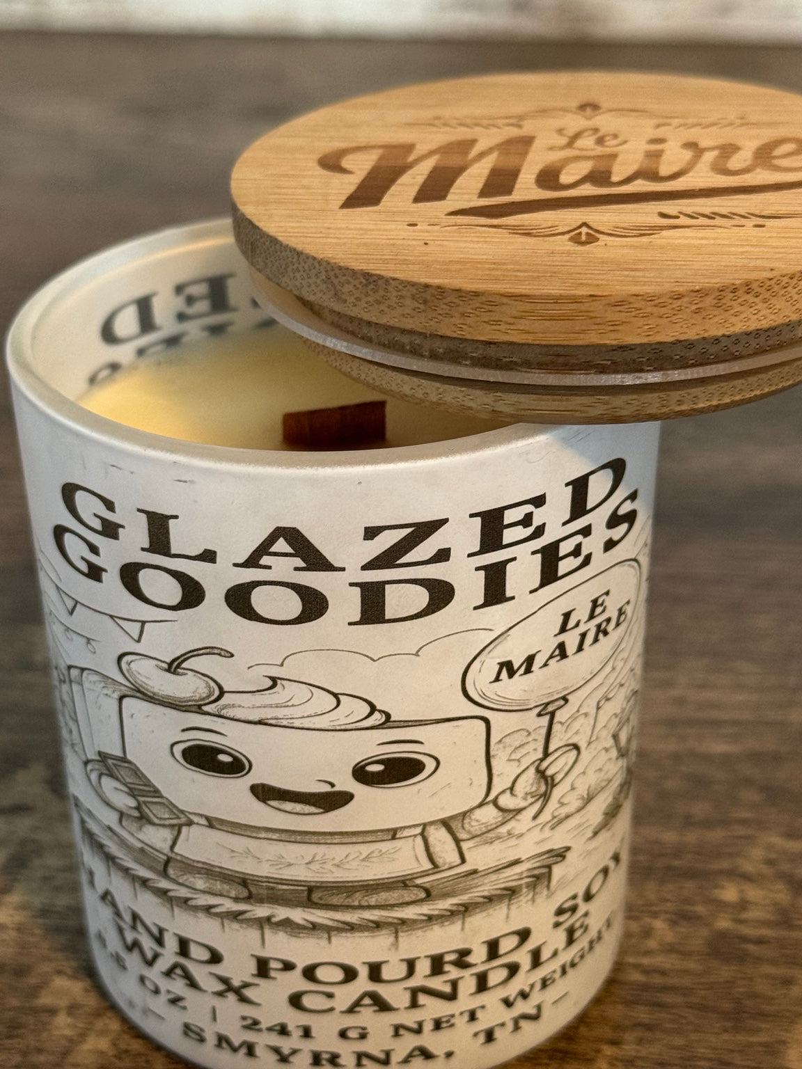 Glazed Goodies cheesecake soy candle open with natural soy wax and wood wick