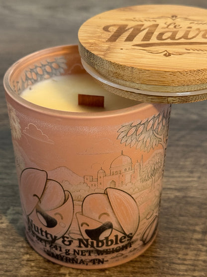Nutty Nibbles pistachio vanilla soy candle open with smooth wax and wood wick
